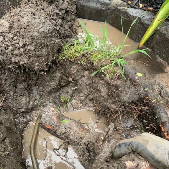 Close-up of underground copper water pipe exposed during a leak repair in Camberwell.